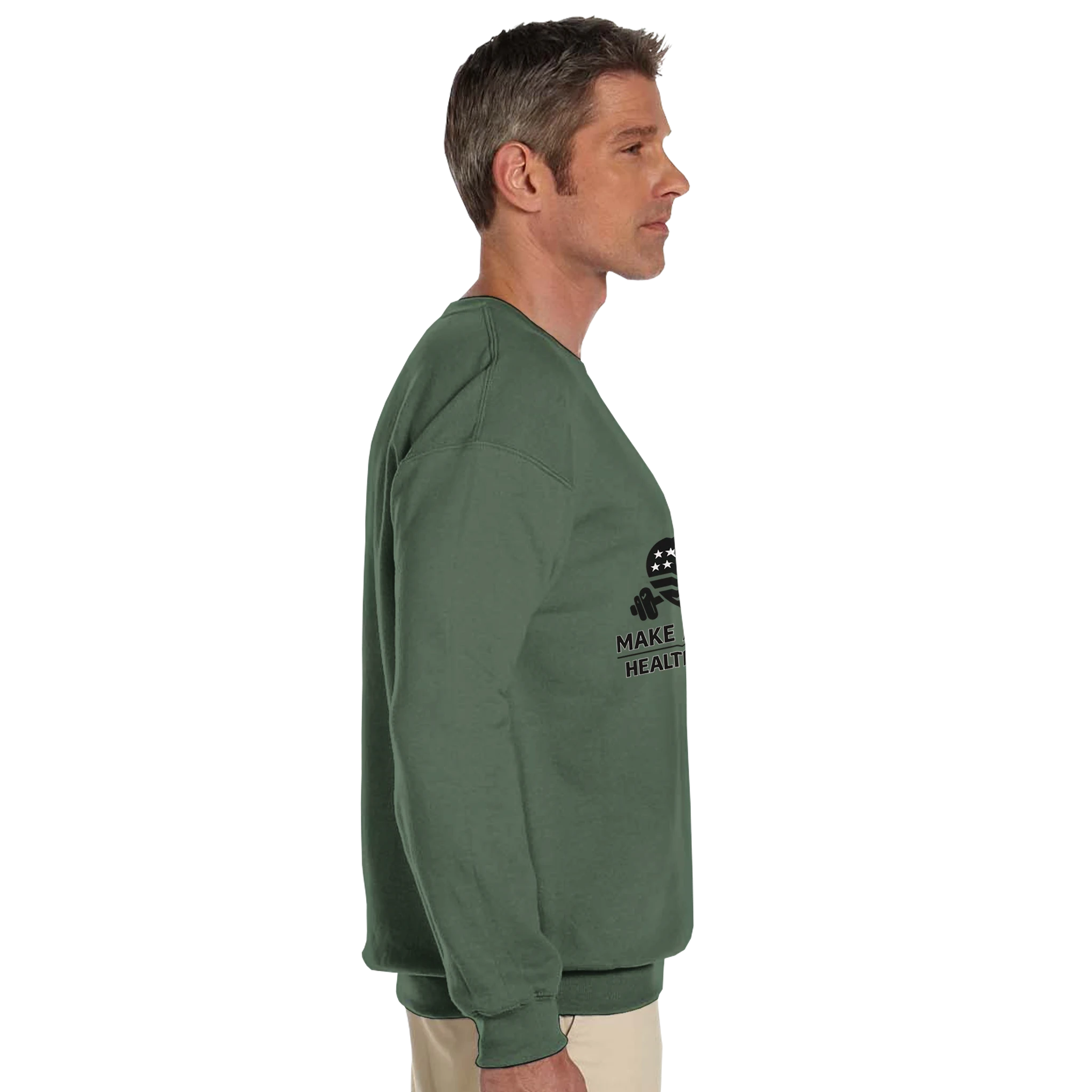 heavy blend crewneck sweatshirt model wearing green 50/50 cotton-poly fleece with ribbed cuffs and classic fit