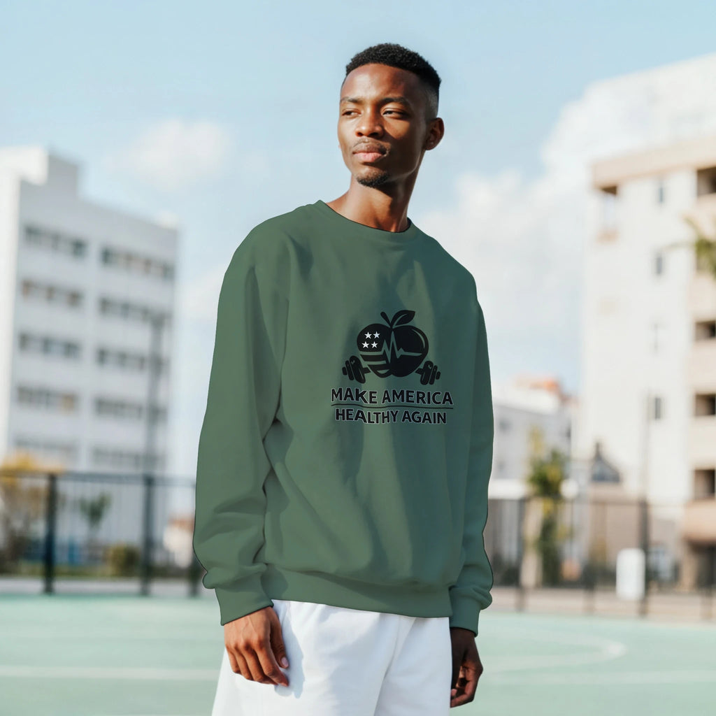 heavy blend crewneck sweatshirt model wearing green crewneck with Make America Healthy Again logo